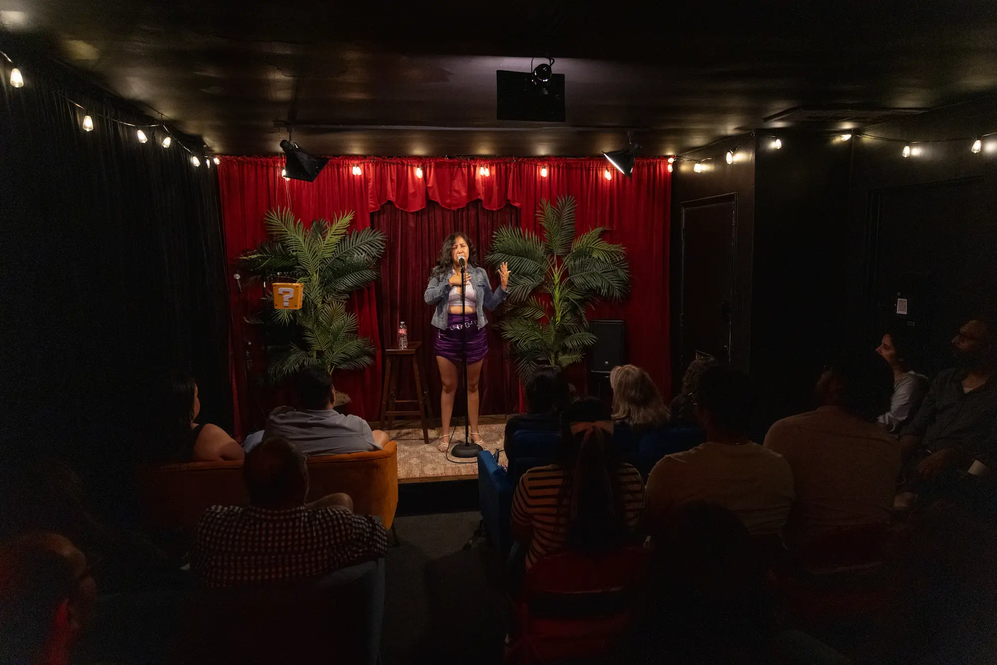 Esmeralda performing standup at Badger and Jam